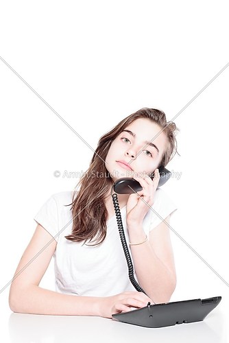 beautiful woman talking on the phone, isolated on white