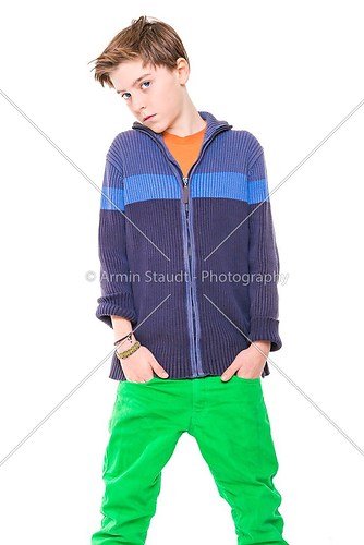 portrait of a casual, cool teenage boy, isolated on white