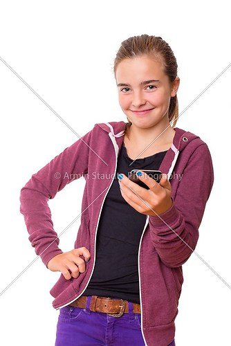 smiling teenage girl with mobile phone, , isolated on white