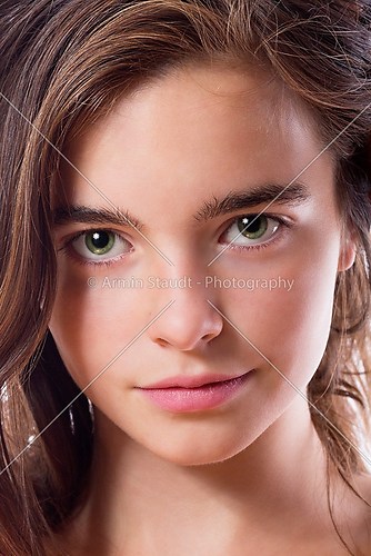 closeup portrait of a teenage girl isolated on white