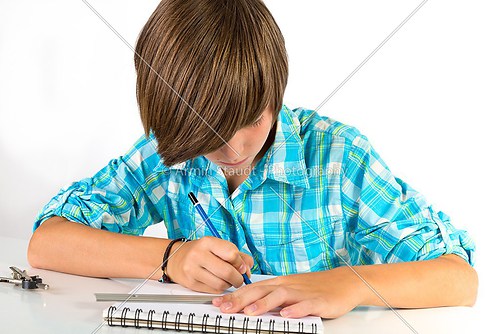 school boy with pencil and ruler, isolated on white