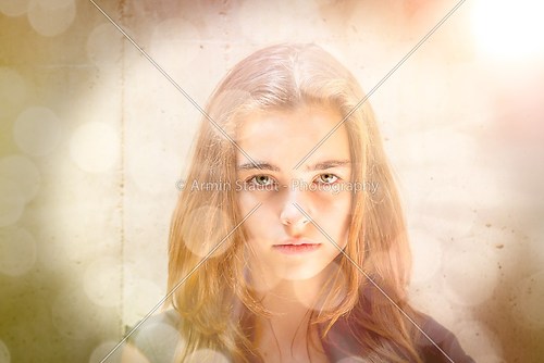 portrait of a beautiful woman illuminated of the sun