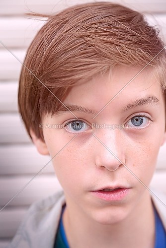 cropped closeup portrait of a teenage boy