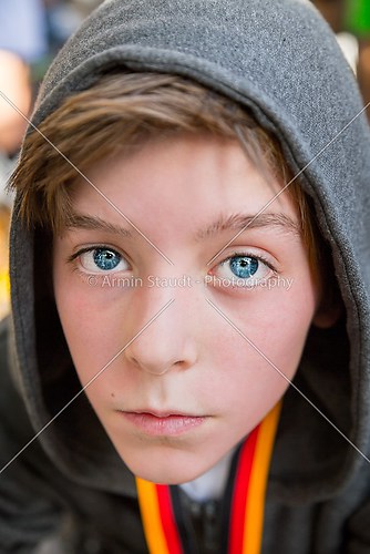 portrait of a teenage boy with grey hoodie sweatshirts, after sp