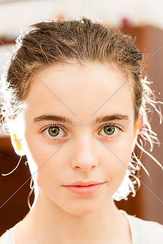 close up portrait with strong back light of a girl