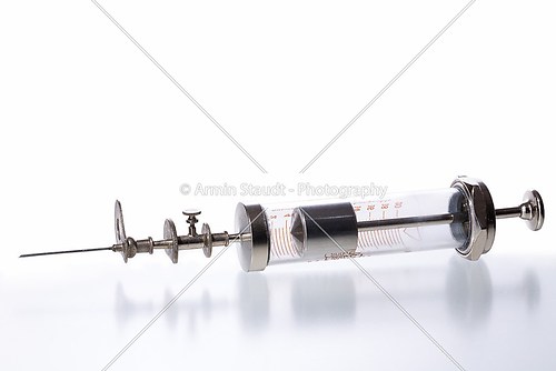 vintage syringes isolated on white