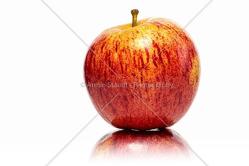 close up red fresh apple , isolated on white