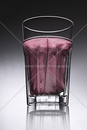 simple water-glass with structured water in red