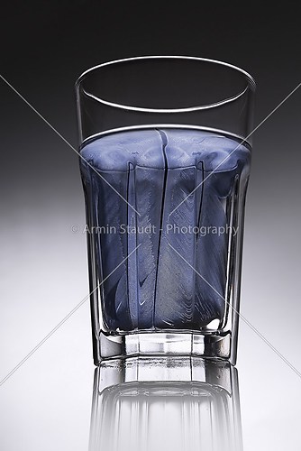 simple water-glass with structured water in blue