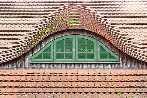 traditional german roof window of a farm house