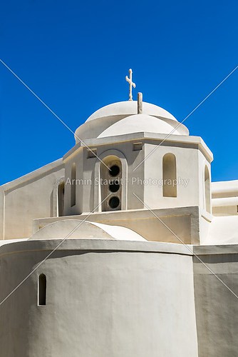 greek chapel isolated on blue sky