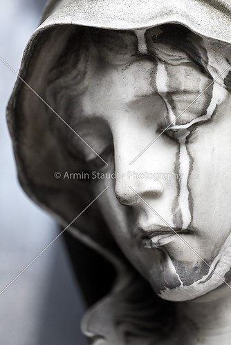 portrait of a weathered white female sculpture