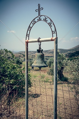 vintage style photo of a greek church bell