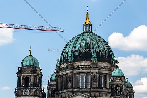 detail of the berliner dom with building crane