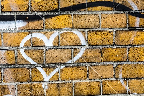 heart graffiti on a brickwall 