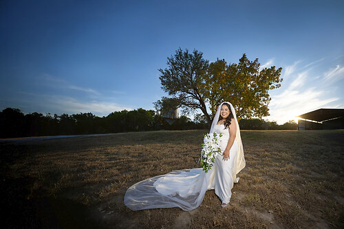 A beautiful bride, a beautiful sunset, and a beautiful beginning.