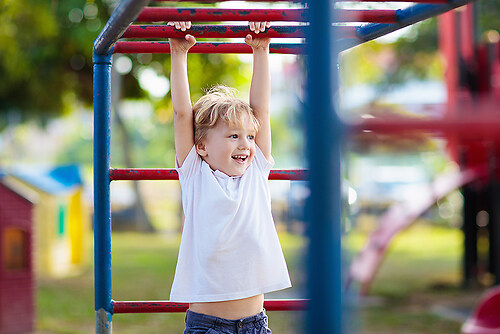 Child on playground. Kids play outdoor. (Kita4)